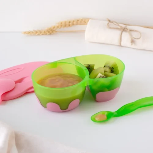 KIOKIDS BOL DOUBLE ANTIDÉRAPANT AVEC COUVERCLE ET CUILLÈRE EN ROSE ET VERT 6M+
